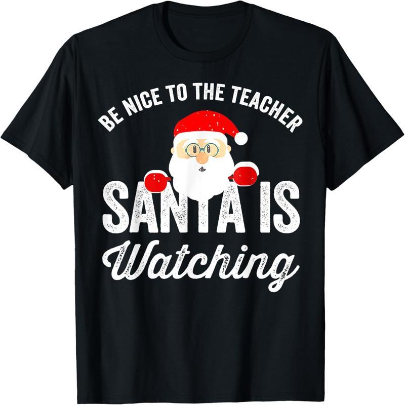 Be nice to the teacher. Santa is looking at a T-shirt.